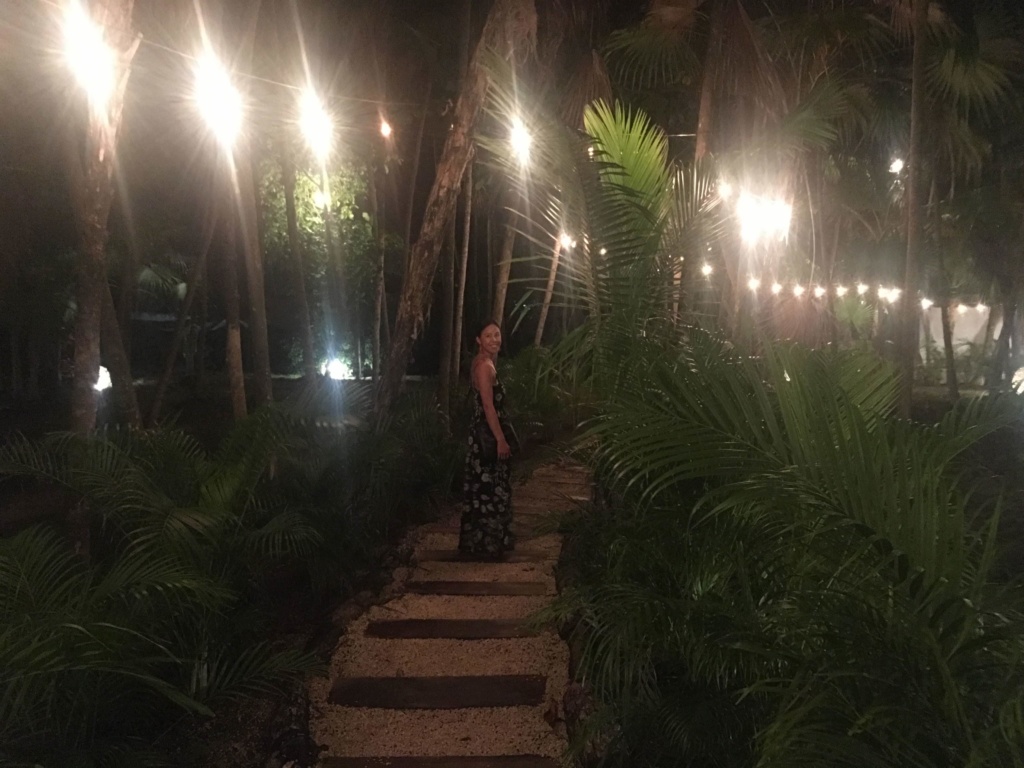 Michelle walking through Los Amigos at night